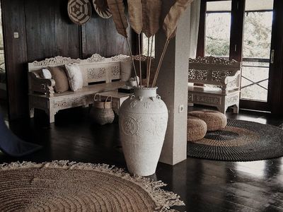 Sunlight streaming through a window onto a wooden floor.